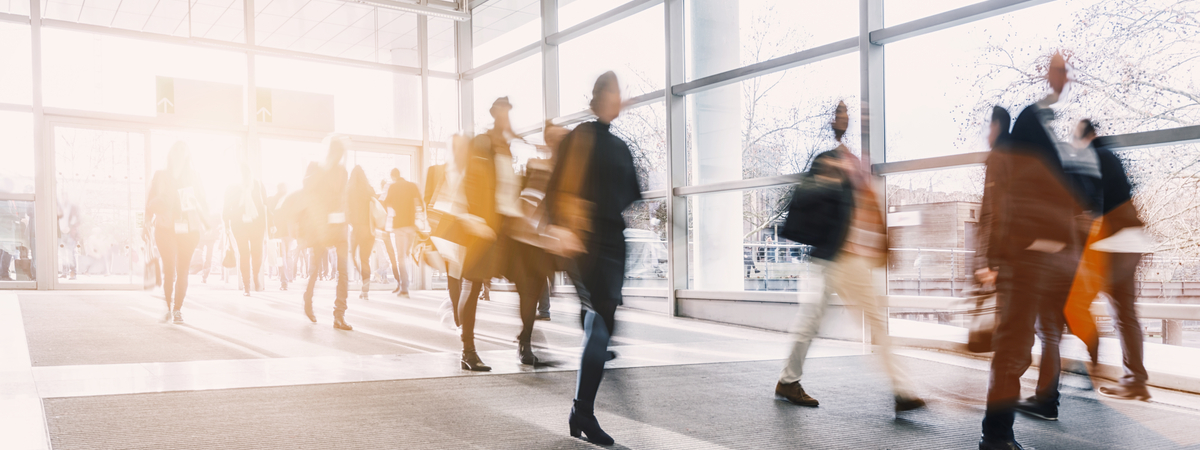 blurred business people at a trade fair